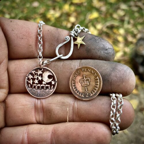 handmade and upcycled summer solstice Stonehenge coin necklace pendant