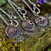 handmade and upcycled summer solstice Stonehenge coin necklace pendant