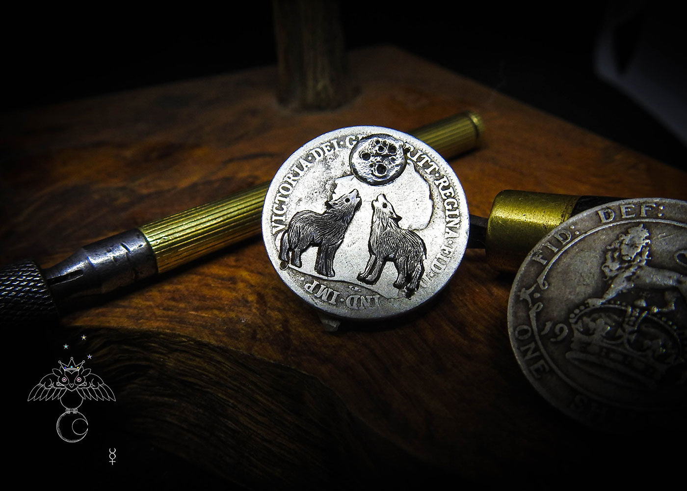 Wolf earrings - handmade and recycled sterling silver shilling coin.