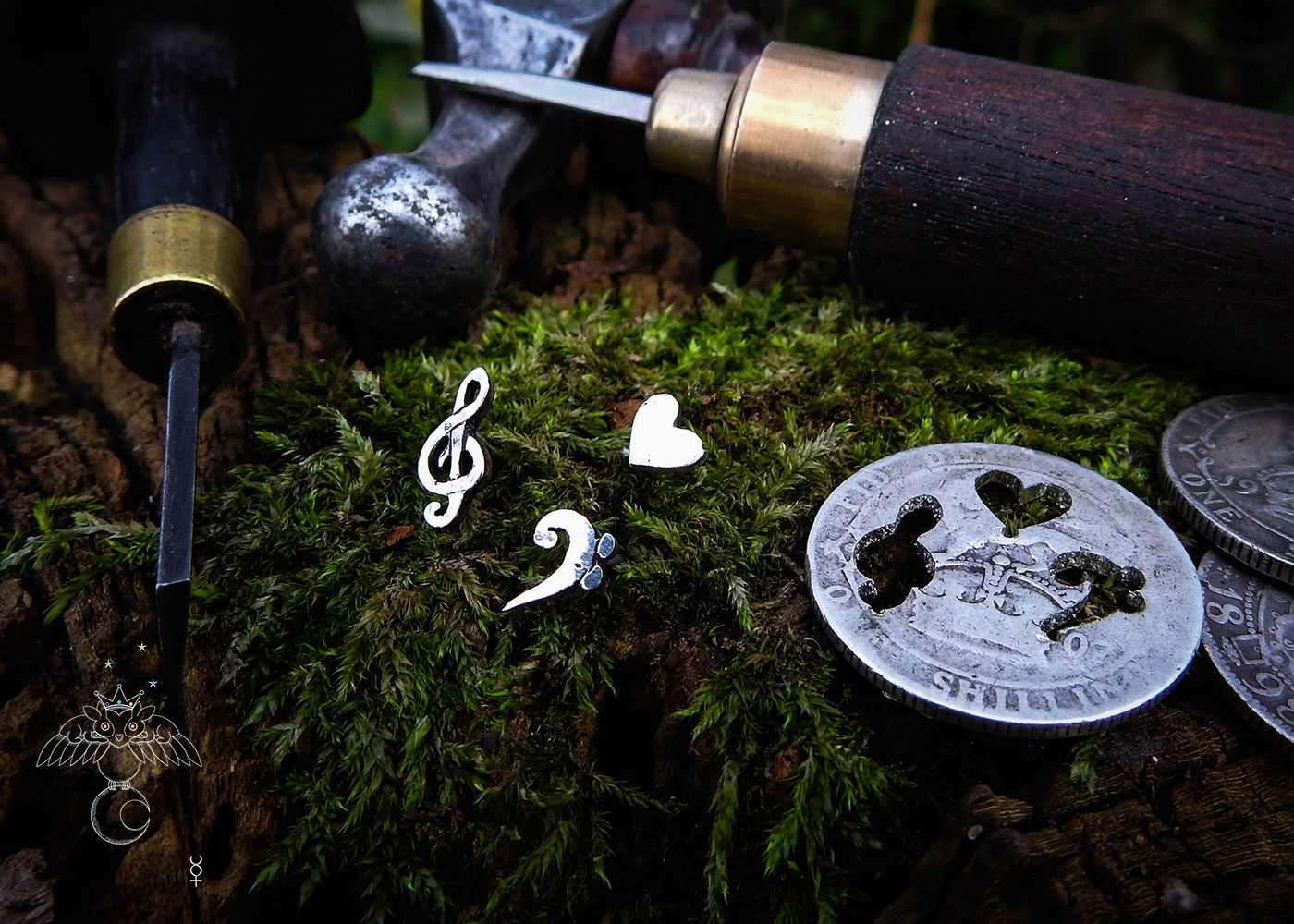 Musician earrings - handcrafted using traditional hand tools and techniques.  Handmade from recycled silver shillings.