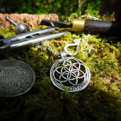 Sacred geometry jewellery - Handcrafted and recycled silver Victorian shilling.