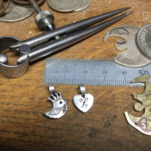lovely bird necklace pendants made from silver and gold