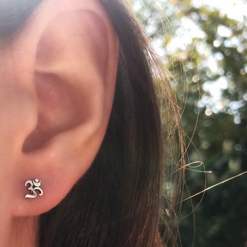 rebirth and regeneration louts flower and om earrings handmade and recycled silver coin