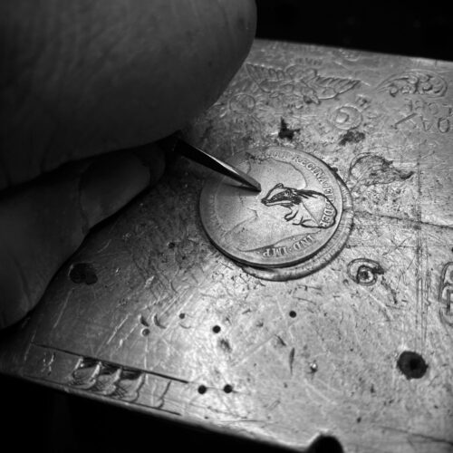 Badger and moon earrings made from recycled silver shillings