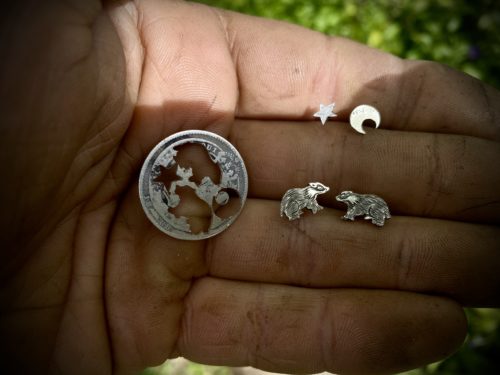 Badger and moon earrings made from recycled silver shillings