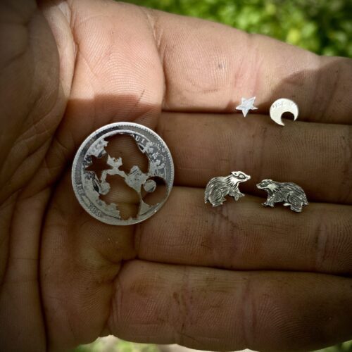 Badger and moon earrings made from recycled silver shillings