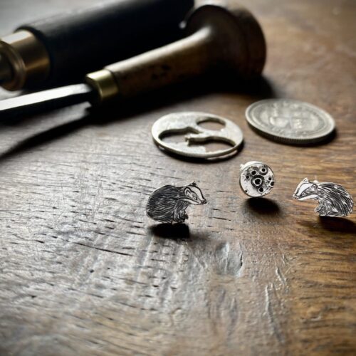 Badger and moon earrings made from recycled silver shillings