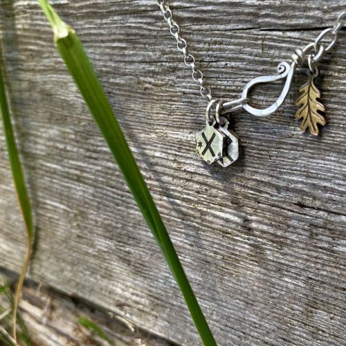 Ansuz the Rune of truth, wisdom and insight. Handcrafted and recycled silver coin