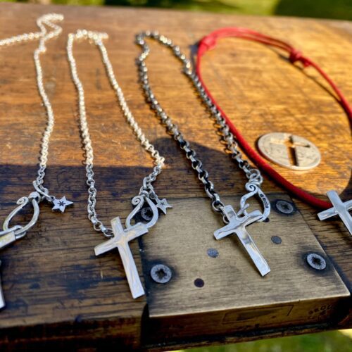 Christian cross handmade in England using ethical, recycled, upcycled raw materials such as sterling silver coins