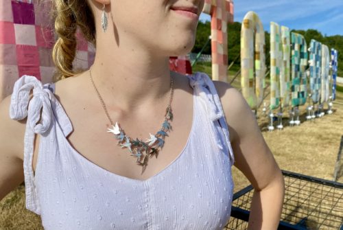 Swallows necklace handcrafted and recycled from a 100 year old silver Shilling coins.
