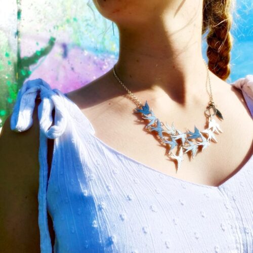 Swallows necklace handcrafted and recycled from a 100 year old silver Shilling coins.