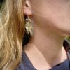 dream seeker feather earrings made from silver coins