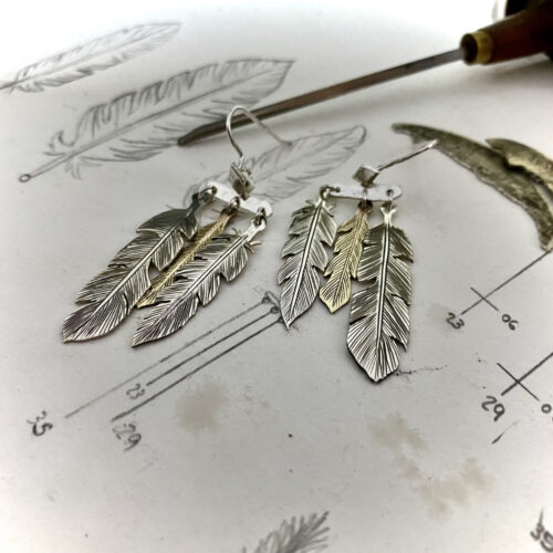 dream seeker feather earrings made from silver coins
