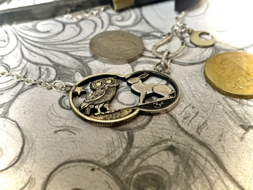 hare-y-gr-owl-er owl and hare coin fusion necklace