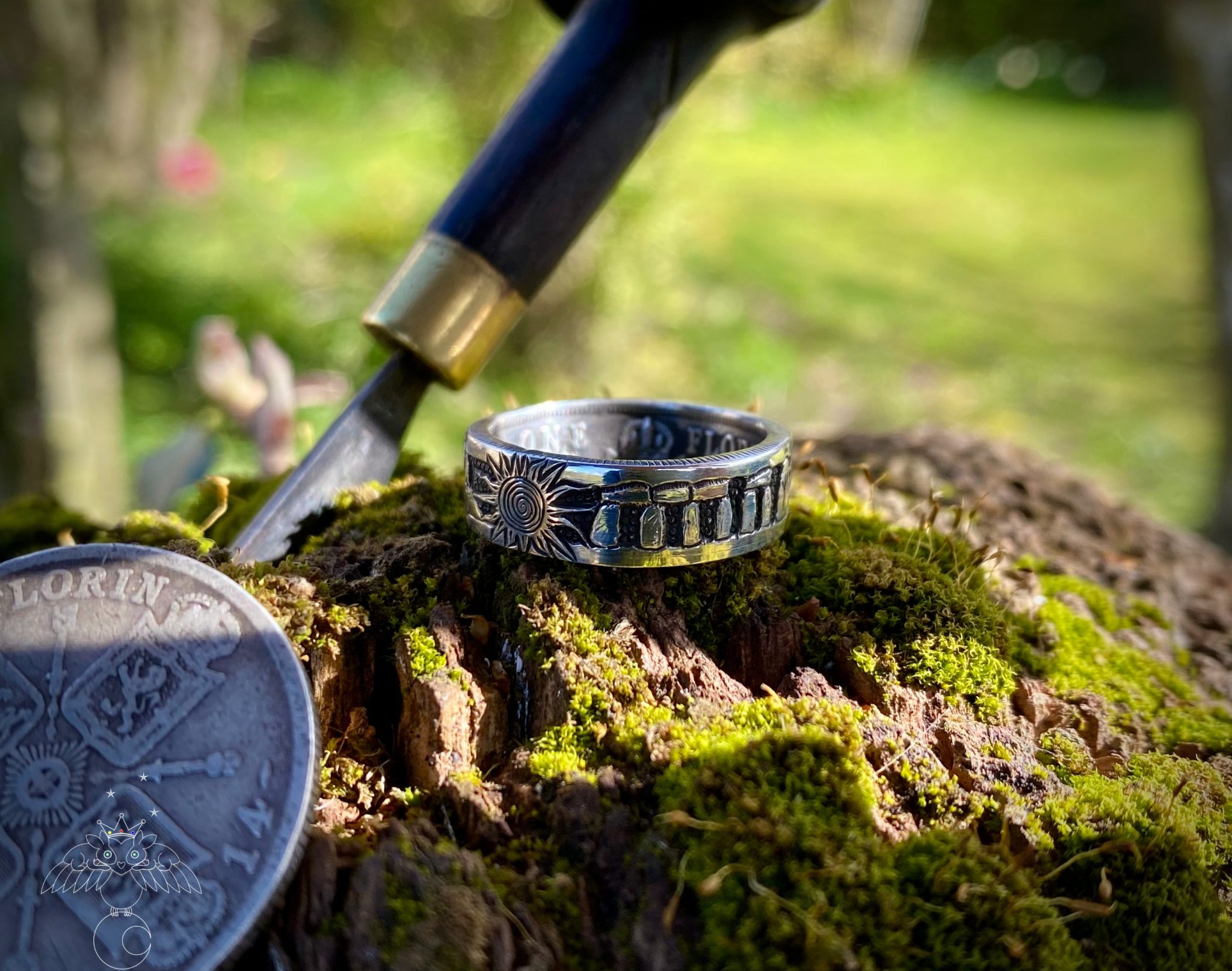 silver coin ring hand made and recycled using traditional hand tools and green ethical principles