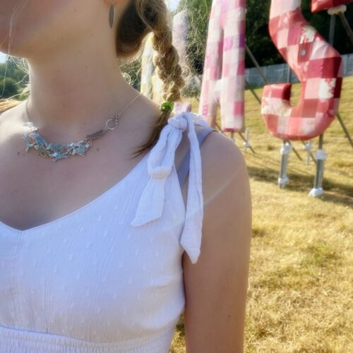 wolves wolf pack necklace handcrafted and recycled from silver shilling coins. Made in Cambridge, England