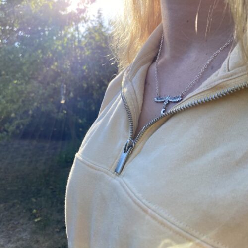 Gillihowlet flying barn owl necklace handmade from sterling silver upcycled from pre 1920 silver coins of the British realm
