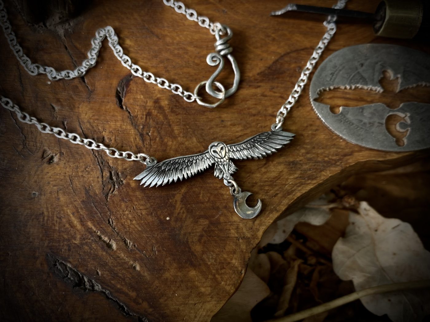Gillihowlet flying barn owl necklace handmade from sterling silver upcycled from pre 1920 silver coins of the British realm