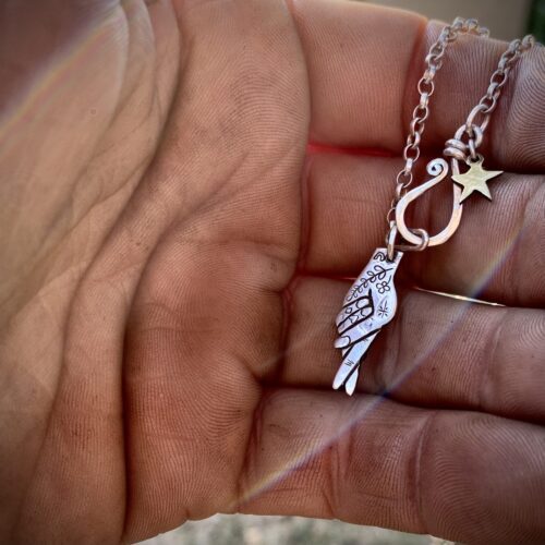fingers crossed lucky symbol imploring Gods intervention early Christian cross and fish symbol necklace ethically made in England