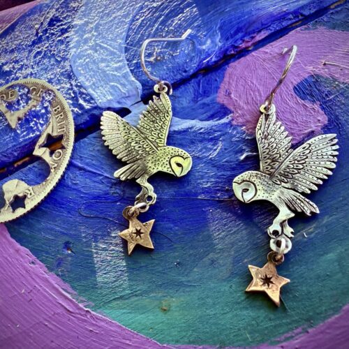 handcrafted and ethical silver flying barn owl earrings pouncing on a star recycled from silver coins