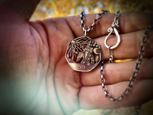 Handcrafted and recycled coin wizard pendant necklace
