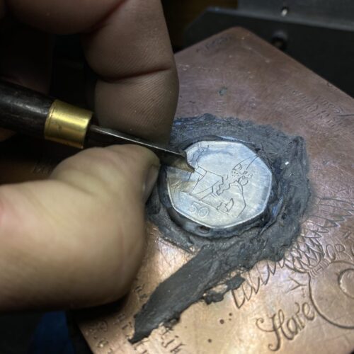 Handcrafted and recycled coin wizard pendant necklace