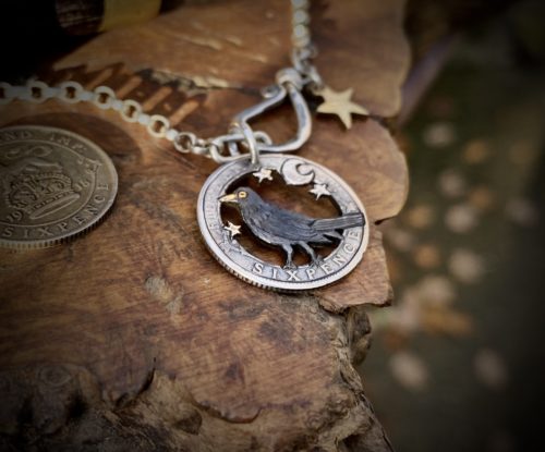 sing a song of sixpence blackbird jewellery. Handcrafted and recycled silver sixpence blackbird necklace totally handcrafted and recycled from old sterling silver sixpence coins. Designed and created by Hairy Growler Jewellery, Cambridge, UK. necklace