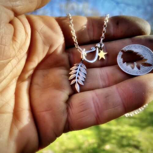 Rowan tree leaves necklace ethical jewellery made from recycled silver coins.