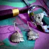 lovely hedgehog earrings made from an old spoon and recycled using traditional hand tools and techniques in Cambridge
