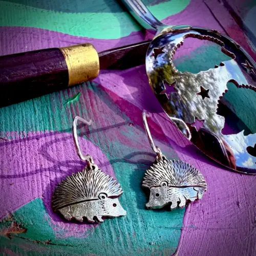lovely hedgehog earrings made from an old spoon and recycled using traditional hand tools and techniques in Cambridge