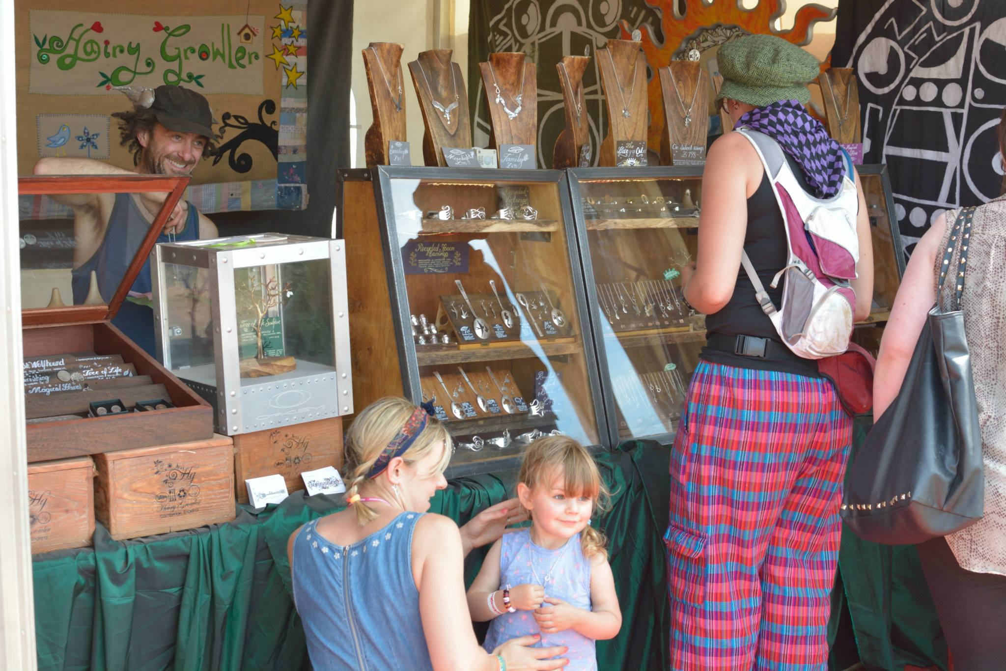 Glastonbury festival art and craft market hairy growler jewellery. Handmade jewellery handcrafted from recycled silver coins, silver spoons and silver forks. Cutlery made into necklaces, pendants, rings, bangles, bracelets, brooches, kuffs, cuffs, cufflinks and earrings.