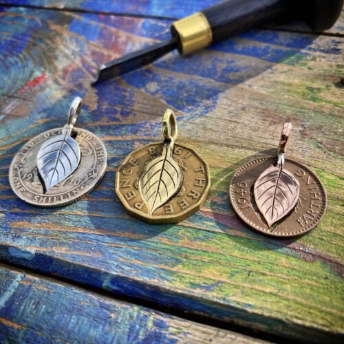 Apple tree leaves necklace ethical jewellery made from recycled silver coins.