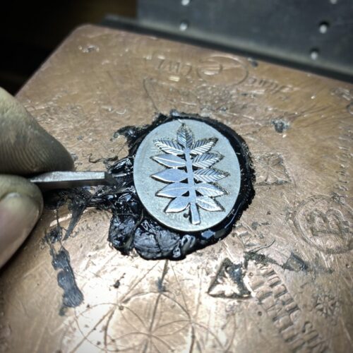 Ash tree leaves necklace ethical jewellery made from recycled silver coins.
