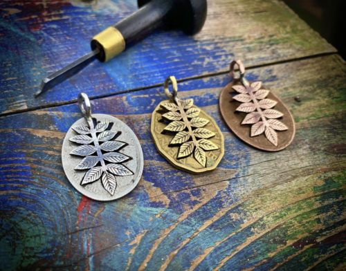 Ash tree leaves necklace ethical jewellery made from recycled silver coins.