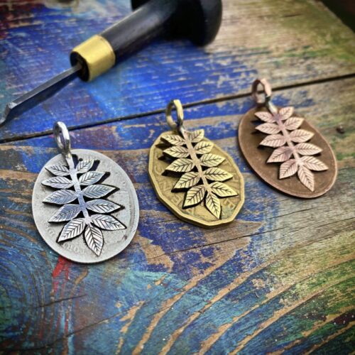 Ash tree leaves necklace ethical jewellery made from recycled silver coins.