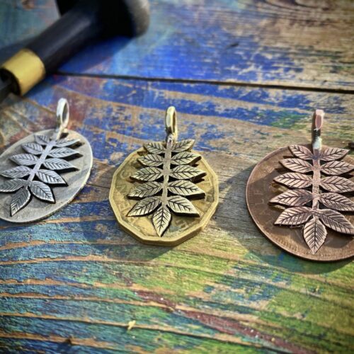 Ash tree leaves necklace ethical jewellery made from recycled silver coins.