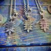 Ash tree leaves necklace ethical jewellery made from recycled silver coins.