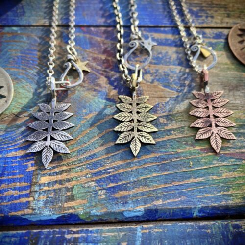 Ash tree leaves necklace ethical jewellery made from recycled silver coins.