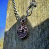 handmade and upcycled summer solstice Strawberry Moon gazing hare solstice coin necklace pendant