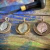 Hazel tree leaves necklace ethical jewellery made from recycled silver coins.