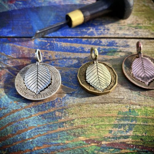 Hazel tree leaves necklace ethical jewellery made from recycled silver coins.