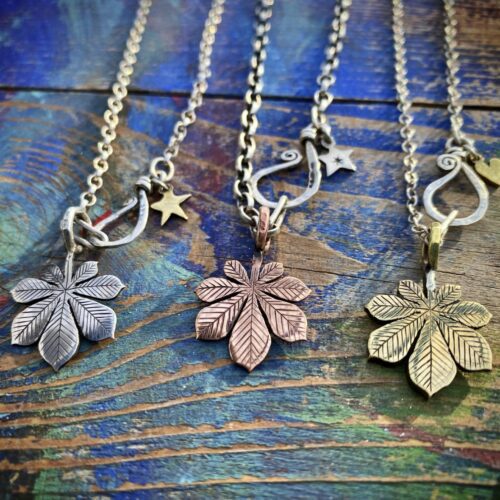 Chestnut tree leaves necklace ethical jewellery made from recycled silver coins.