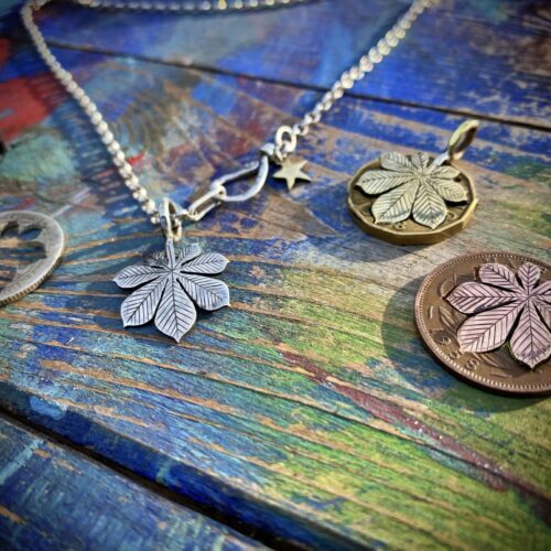 Chestnut tree leaves necklace ethical jewellery made from recycled silver coins.