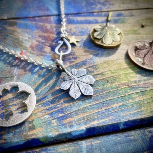Chestnut tree leaves necklace ethical jewellery made from recycled silver coins.