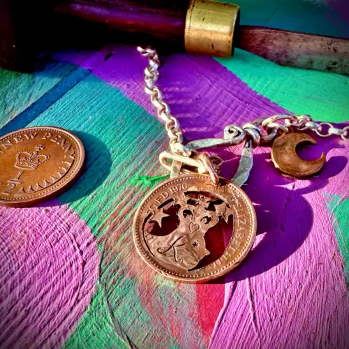 50th birthday present ethical handmade handcrafted jewellery necklace made from old 1973 coin little bird pendant