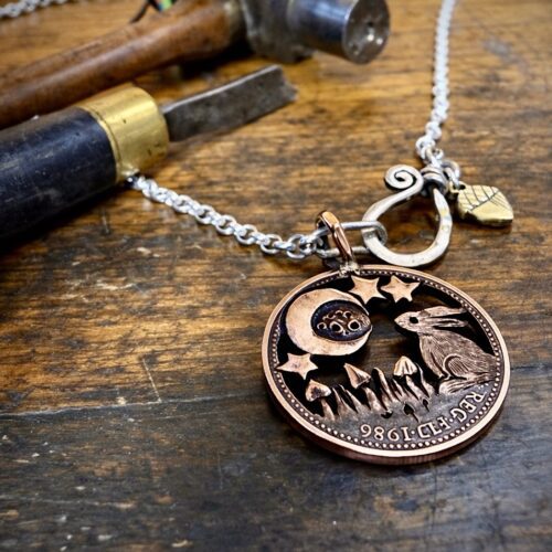 1986 handmade and upcycled summer solstice Strawberry Moon gazing hare solstice coin necklace pendant