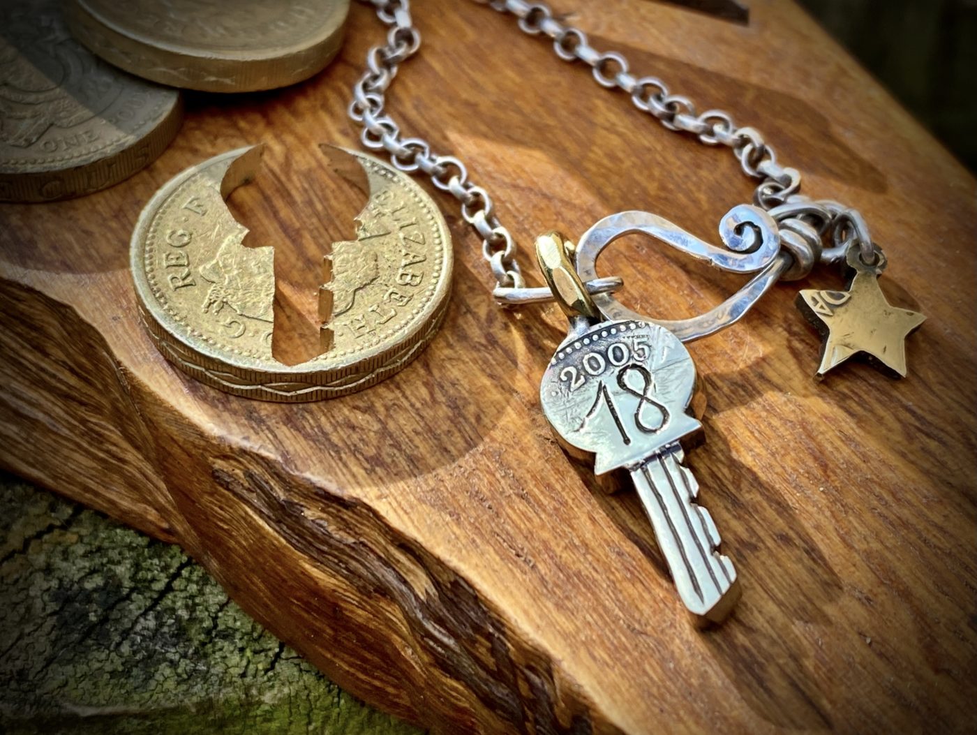 18th birthday gift idea handmade and ethically recycled key necklace pendant made in England from a upcycled pound coin 2005