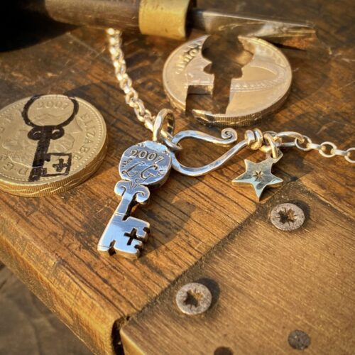18th birthday gift idea handmade and ethically recycled key necklace pendant made in England from a upcycled pound coin 2007