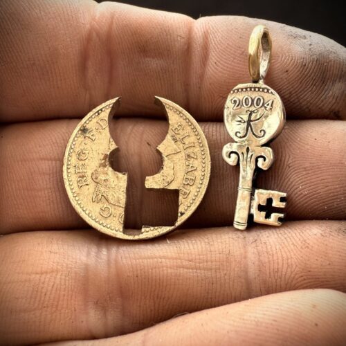 21st birthday gift idea handmade and ethically recycled key necklace pendant made in England from a upcycled pound coin 2005