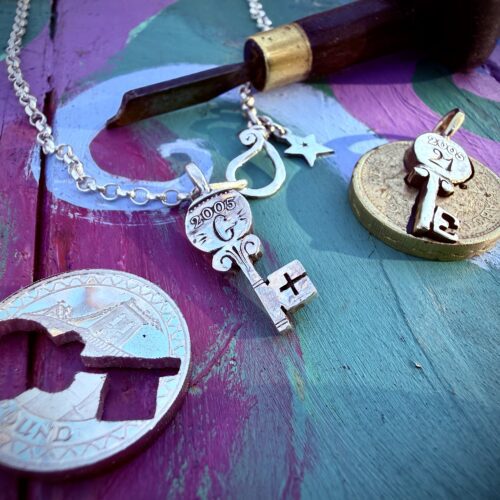 21st birthday gift idea handmade and ethically recycled key necklace pendant made in England from a upcycled pound coin 2005